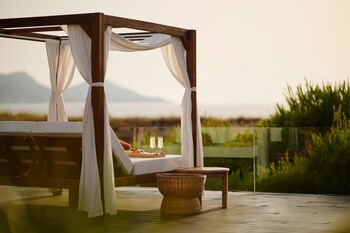 Indoor pool, outdoor pool, pool umbrellas, pool loungers