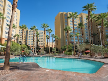 5 outdoor pools, open 8:00 AM to 10:00 PM, pool umbrellas, sun loungers
