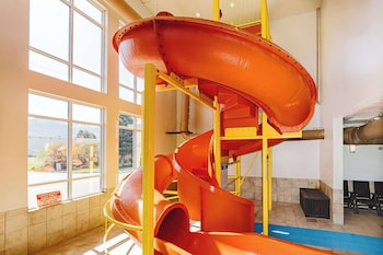 Indoor pool, open 8:00 AM to 10:00 PM, pool loungers