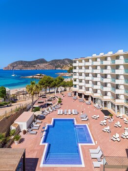 Indoor pool, outdoor pool, pool umbrellas, sun loungers