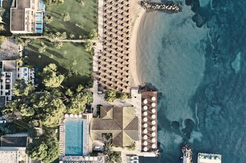 Indoor pool, seasonal outdoor pool, pool umbrellas, sun loungers