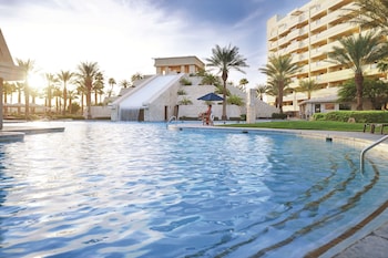 Outdoor pool, open 10:00 AM to 6:00 PM, pool umbrellas, sun loungers