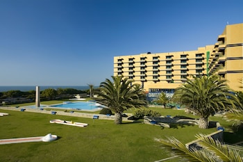 Indoor pool, outdoor pool, pool umbrellas