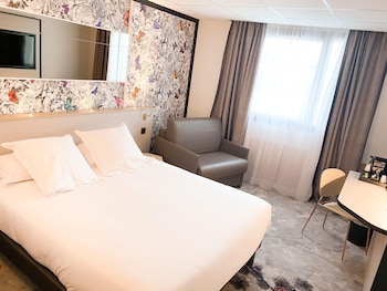 Chambre avec lits jumeaux | Bureau, rideaux dâobscurcissement, systĂšme dâinsonorisation