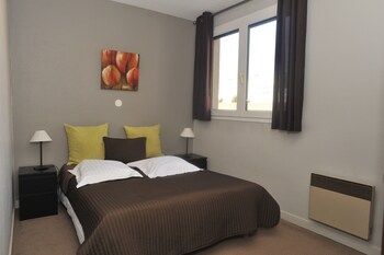 Premium bedding, blackout drapes, soundproofing, iron/ironing board