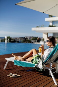 2 indoor pools, seasonal outdoor pool, pool umbrellas, sun loungers