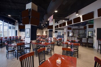 Double Queen Room 1 | Living area | 49-inch flat-screen TV with satellite channels, TV