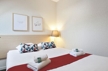 Standaard kamer | Een bureau, geluiddichte muren, een strijkplank/strijkijzer, gratis wifi