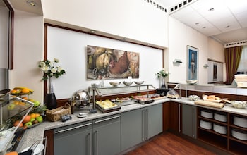 Daily buffet breakfast (EUR 15 per person)