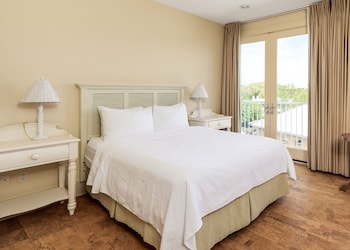 Enjoy waterfront dining and leisure options from this multi-level hotel, with a dock and walkway offering access to the water.