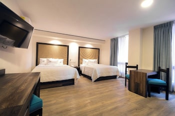 Junior Suite Deluxe | 1 habitación, caja de seguridad en la habitación y escritorio