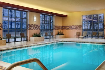 Relax in comfort with plush seating and a soothing ambiance, enhanced by natural elements and warm candlelight.
