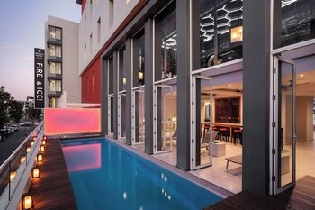 Outdoor pool, open 6:00 AM to 9:00 PM, sun loungers