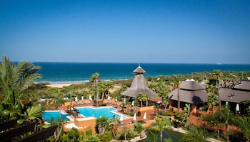 Indoor pool, 5 outdoor pools, pool umbrellas, pool loungers