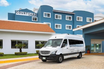 Outdoor pool, open 8:00 AM to 10:00 PM, pool umbrellas