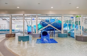Indoor pool, seasonal outdoor pool, open 8 AM to 10 PM, sun loungers