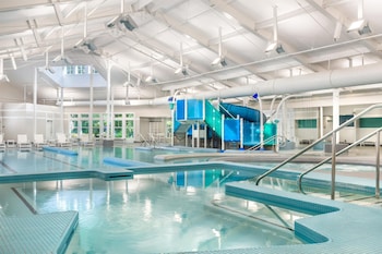 Indoor pool, seasonal outdoor pool, open 8 AM to 10 PM, sun loungers