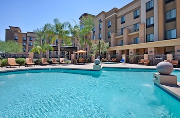 Outdoor pool, open 9:00 AM to 9:00 PM, pool loungers