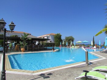 Indoor pool, outdoor pool, pool umbrellas, pool loungers