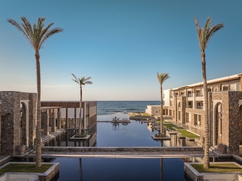 Indoor pool, pool umbrellas, pool loungers
