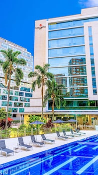 Outdoor pool, pool umbrellas, sun loungers