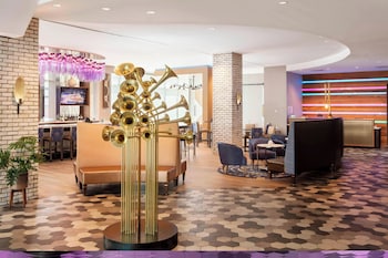 2 bars/lounges, rooftop bar, lobby lounge