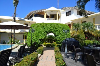 2 outdoor pools, open 7 AM to 11:30 PM, free cabanas, pool umbrellas