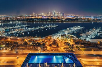 Outdoor pool, open 8:00 AM to 10:00 PM, free cabanas, pool umbrellas