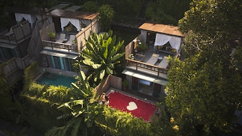 Suite, 2 chambres, vue jardin | 1 chambre, mini-bar avec articles gratuits