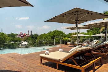 Suite, 1 cama de matrimonio grande, vistas al jardín (SUITE KING) | Vistas desde la habitación