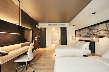 Chambre Premier, 1 trÚs grand lit, vue sur la ville | Draps en coton égyptien, literie de qualité, minibar