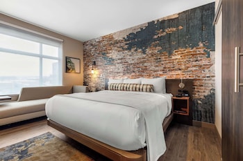Standard Room, 1 King Bed, Non Smoking | Down comforters, in-room safe, individually decorated