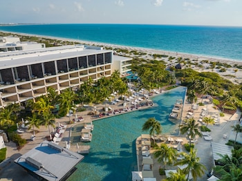 3 outdoor pools, open 8 AM to 8 PM, cabanas (surcharge), pool umbrellas