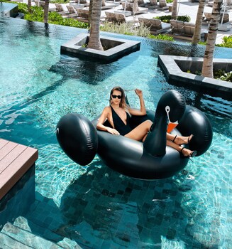 3 outdoor pools, open 8 AM to 8 PM, cabanas (surcharge), pool umbrellas
