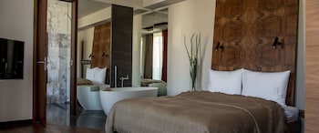 Indoor pool, open 6:00 AM to 11:30 PM, pool loungers