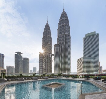 Outdoor pool, open 7:00 AM to 7:00 PM, free cabanas, pool umbrellas
