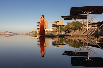 4 outdoor pools, cabanas (surcharge), pool umbrellas