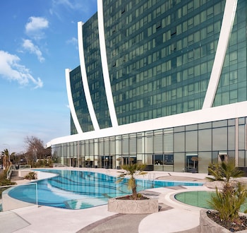 Presidential Suite with King Size Bed | Living room | 42-inch LCD TV with satellite channels