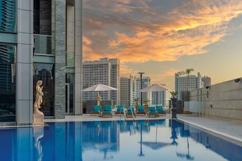 Outdoor pool, pool umbrellas, pool loungers