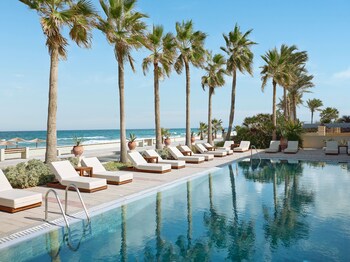 Indoor pool, seasonal outdoor pool, pool umbrellas, sun loungers