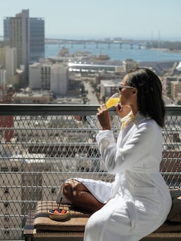 Presidential Suite, 2 Bedrooms | Living room | 36-inch LCD TV with digital channels, TV, pay movies