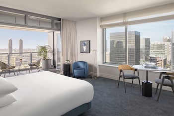 Presidential Suite, 2 Bedrooms | Living room | 36-inch Smart TV with digital channels, pay movies