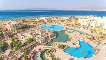 Indoor pool, outdoor pool, open 9:00 AM to 6:00 PM, pool umbrellas