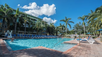 Outdoor pool, pool umbrellas, sun loungers