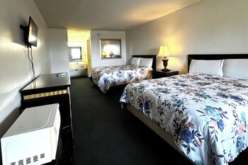 Desk, iron/ironing board, bed sheets