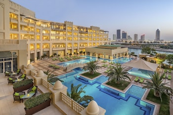 Indoor pool, 4 outdoor pools, open 7:00 AM to 8:00 PM, pool umbrellas