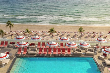 Premium bedding, down comforters, minibar, in-room safe