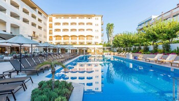 Indoor pool, 2 outdoor pools, open 10:00 AM to 6:00 PM, pool umbrellas