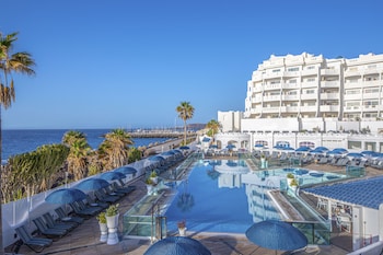 Outdoor pool, a heated pool, sun loungers