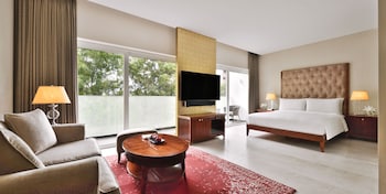 Outdoor pool, open 7:00 AM to 8:00 PM, pool umbrellas, pool loungers